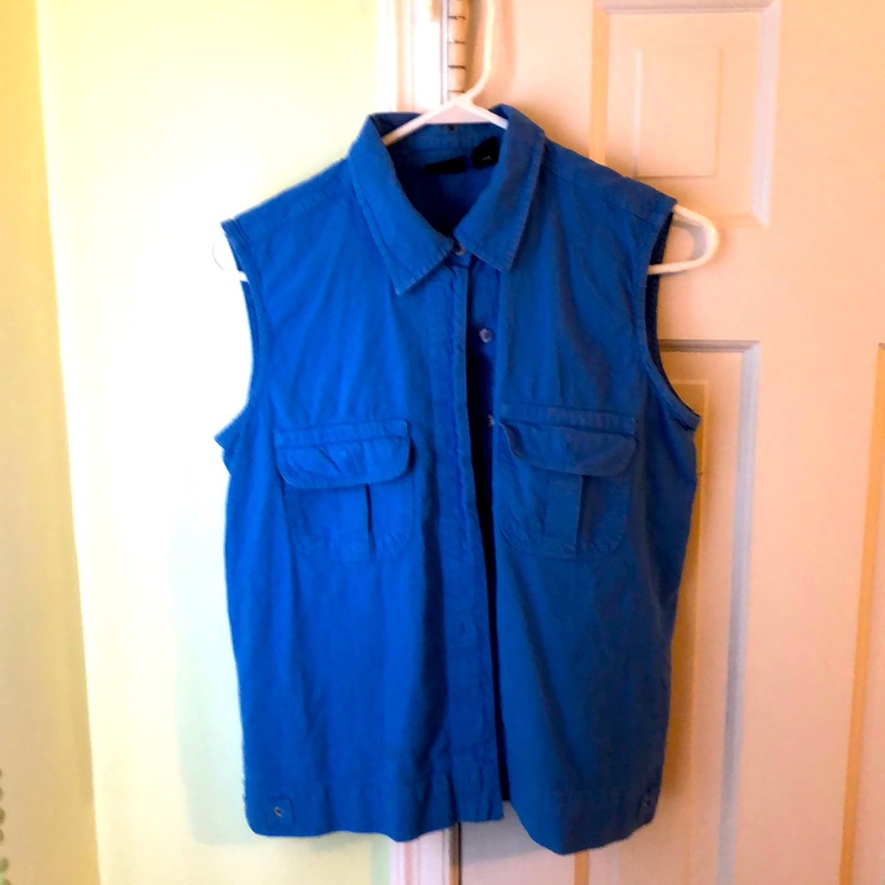 Button up sleeveless shirt.